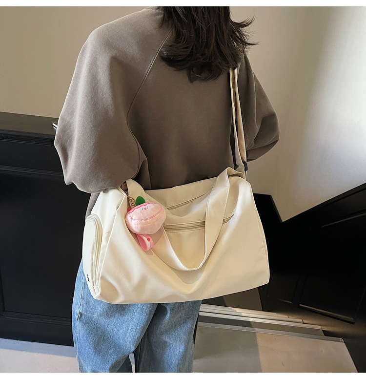 Sports yoga fitness bag 2025 new college student shoulder bag cute pendant-tipped crossbody bag popular travel bag