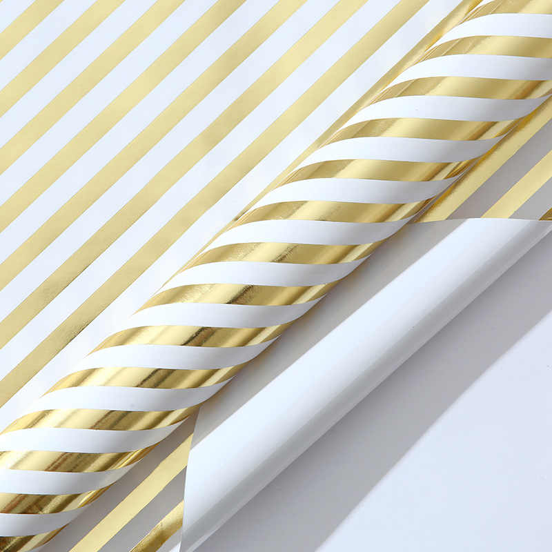 Amazon venta caliente de papel de gran tamaño de papel de papel de bronce estampado dorado ondulado punto inclinado banda de regalo papel de embalaje mayorista