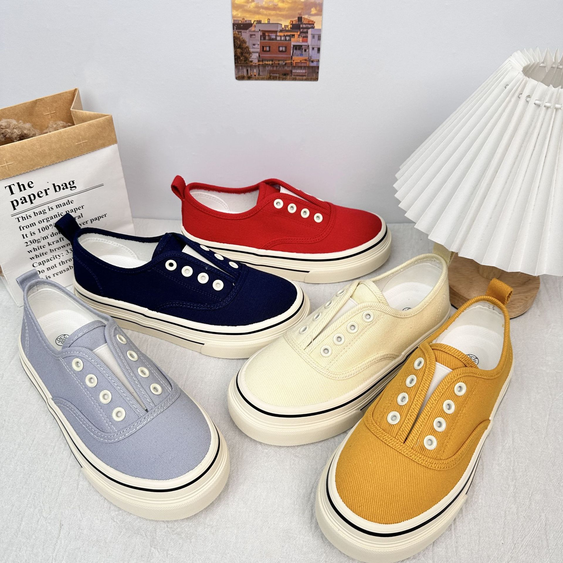 6650 zapatos de lona de color sólido de estilo simple 2025 verano nuevo estilo de un pie zapatos casuales de suela gruesa de corte bajo