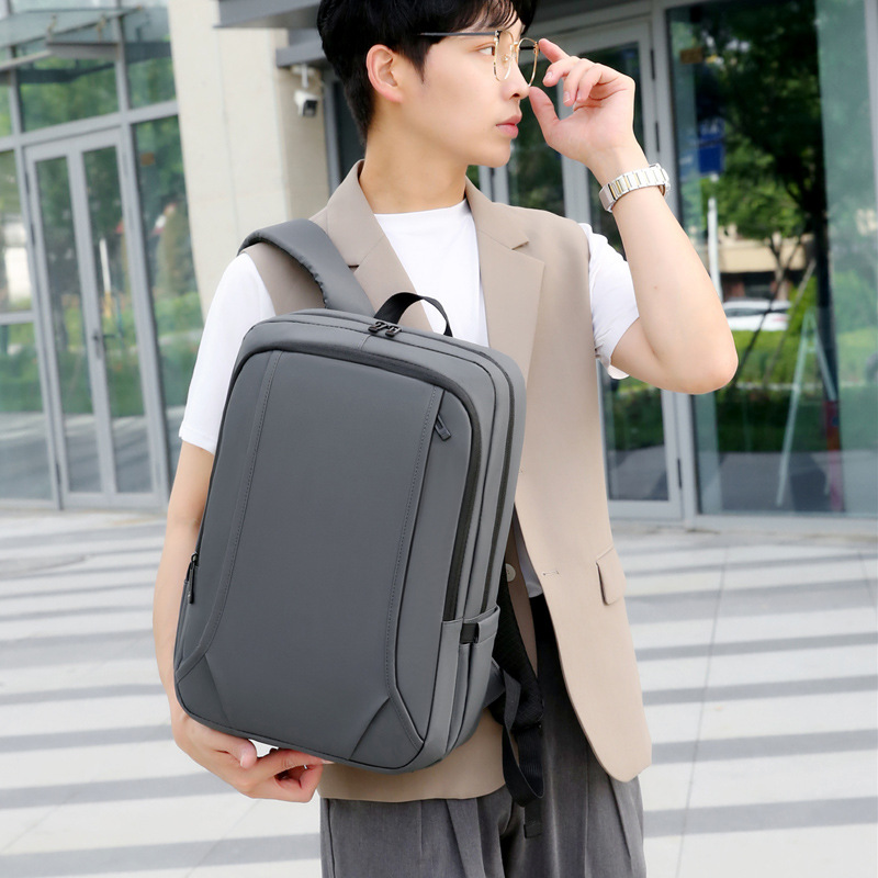 Large-capacity backpack men's new USB charging casual student school bag business commuting simple computer backpack_voghion.com