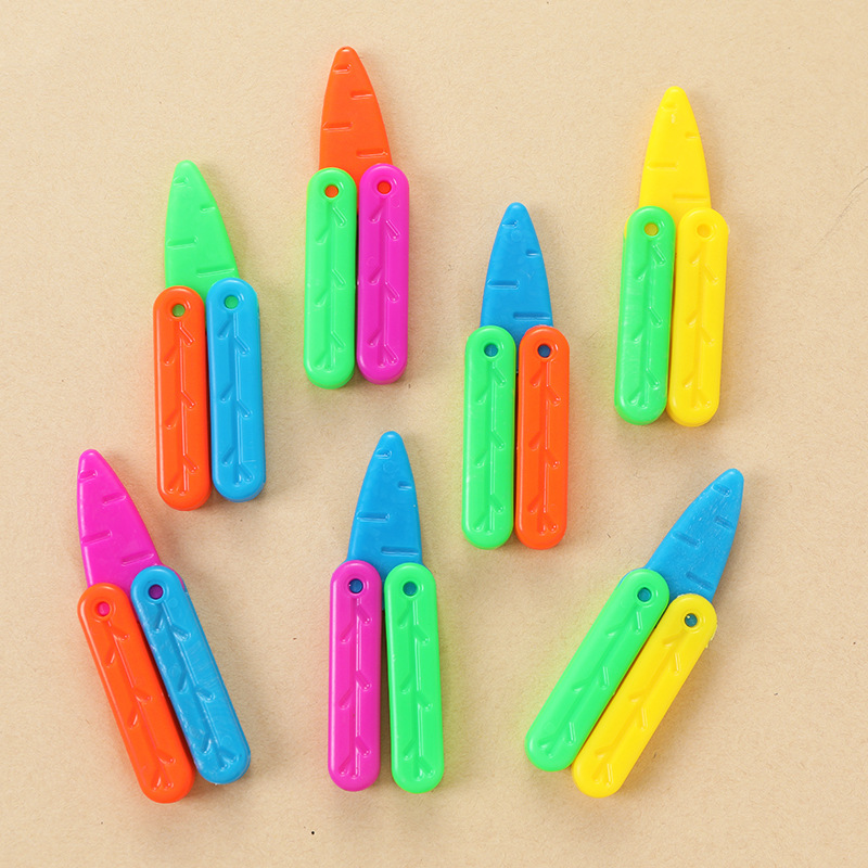 Mini mariposa cuchillo de rábano cuchillo de descompresión cuchillo de rábano que emite luz lindo bebé juguete internet celebridad plegable mariposa cuchillo