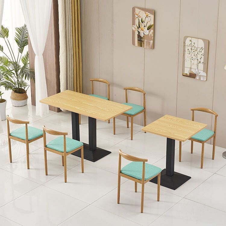 Fast food dining table and chair set, simple imitation solid wood iron art breakfast table and chairs, suitable for snack, milk tea, dessert, and restaurant use Fast food dining table and chair set, simple imitation solid wood iron art breakfast table and chairs, suitable for snack, milk tea, dessert, and restaurant use