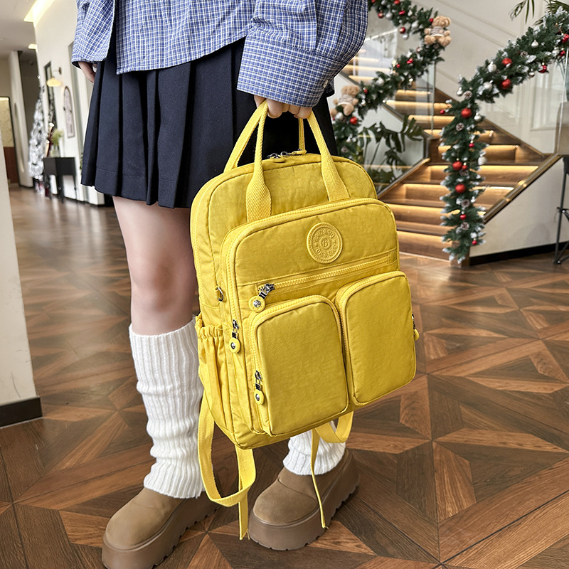 2025 primavera nueva bolsa de mamá mochila de moda mochila de nylon mochila de viaje de gran capacidad mochila multifuncional