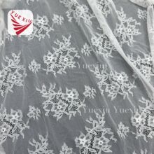 厂家批发锦氨弹力提花网眼布剪花柔软蕾丝梅花内衣打底面料跨境布