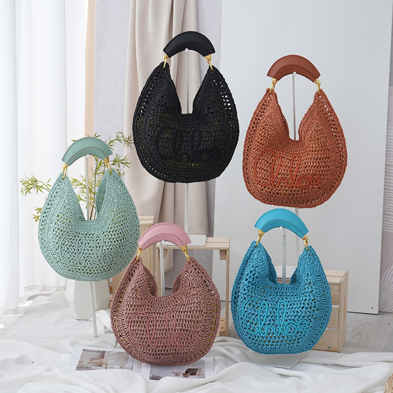 Cross-Border New Niche Design Straw Crescent Bag with Pu Soft Leather Texture, Fashionable Women's Commuter Underarm Bag