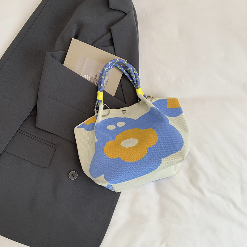 Bolsa de impresión coreana de niña nicho bolso de cubo de diseño diario versátil bolso de mano para estudiantes de viaje diario