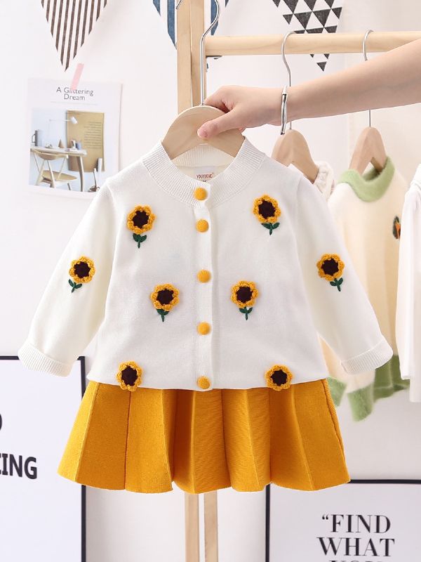 Una pieza de envío nuevo traje de punto de primavera para niñas, vestido de suéter de ganchillo lindo para niñas, cárdigan cálido, falda plisada