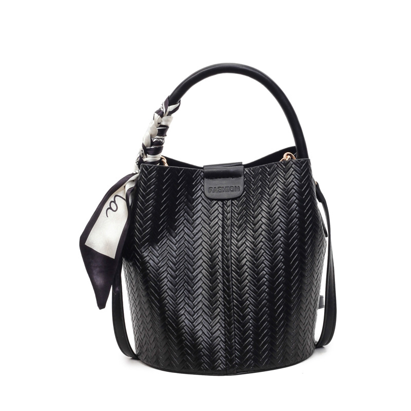 Bolso de mano transfronterizo retro simple bolso de cubo de agua mujer otoño / invierno 2025 nuevo estilo versátil bolso de hombro bolso de transporte
