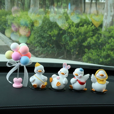 Car ornaments: Car Center Console Car Interior - good-duck-lying-down-duck-cool-duck-waving-duck-comes-with-anti-slip-mat-colorful-shaking-head-balloon