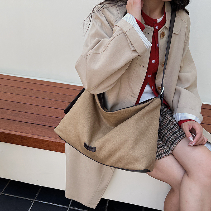 2025 otoño y invierno nuevo estilo coreano perezoso bolsa de lona de moda de mujer gran capacidad de hombro mochila de viaje bolsas de brazo