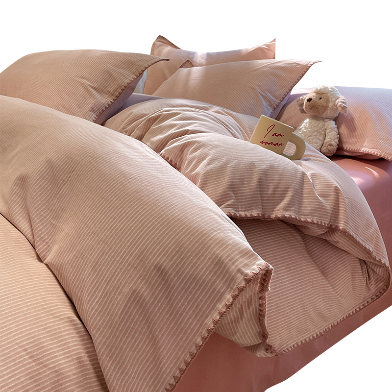 A clase de agujas de rayas grises primavera y otoño molido cuatro piezas de invierno engrosado sábanas de algodón