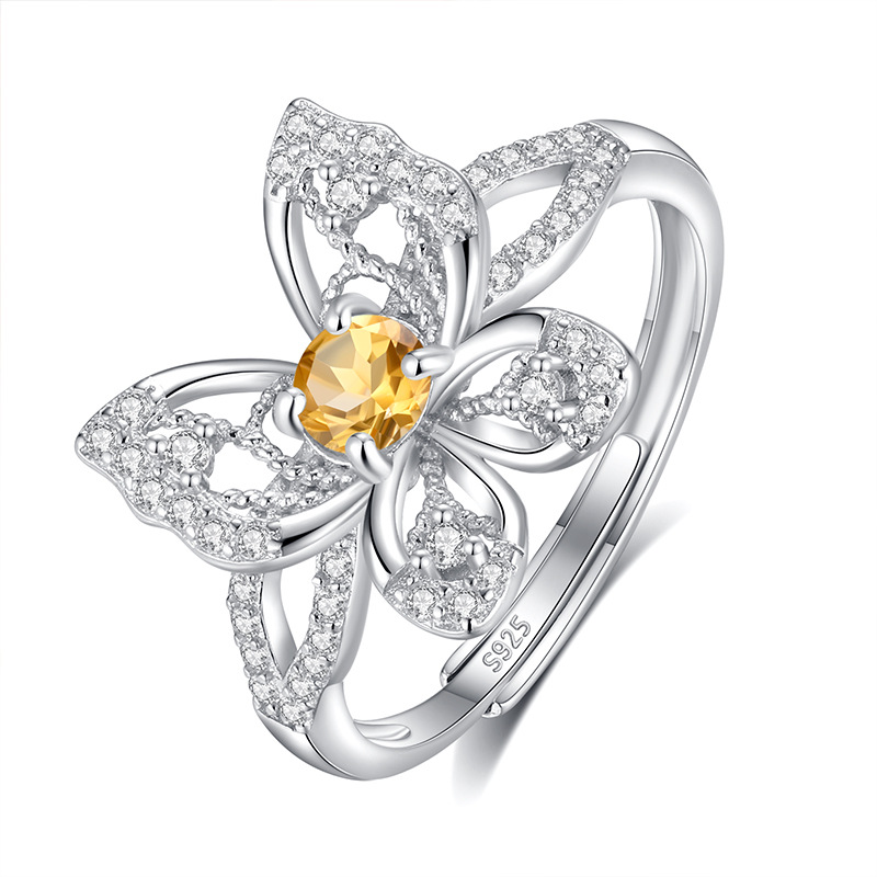Transmisión en vivo de alta calidad tesoro de color estilo caliente s925 con incrustaciones de plata de ley anillo de mariposa de cristal natural moda femenina todo fósforo temperamento joyería