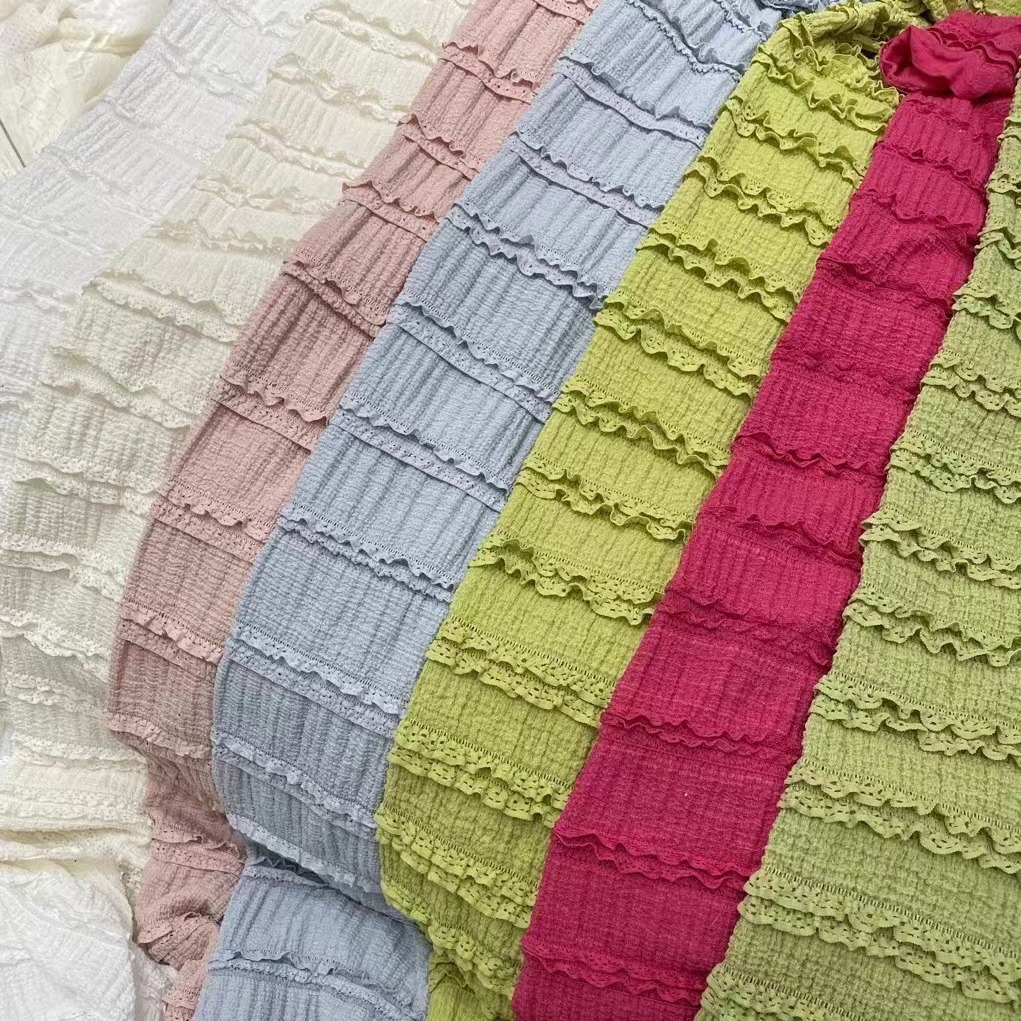 弹力蛋糕裙牛百叶法式蕾丝面料 层次褶皱木耳边森系时装 现货供应