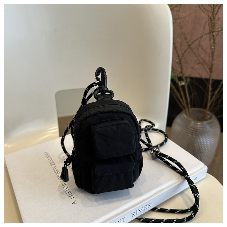 Mini colgante bolso de cambio 2025 nuevo cross-border nylon impermeable bolso de auriculares de bolsillo de hombro