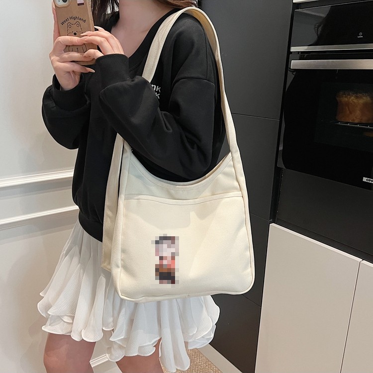 2025 nuevo bolso de lona bolso de hombro de gran capacidad para mujer bolso casual de todo fósforo para estudiantes en clase bolso de viaje