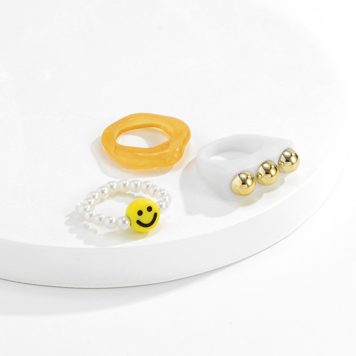 Personalizado geomtrico MultiColor perla sonriente conjunto anillos Europa y Amrica Cruz frontera moda ahuecado anillo Acrlicopicture6