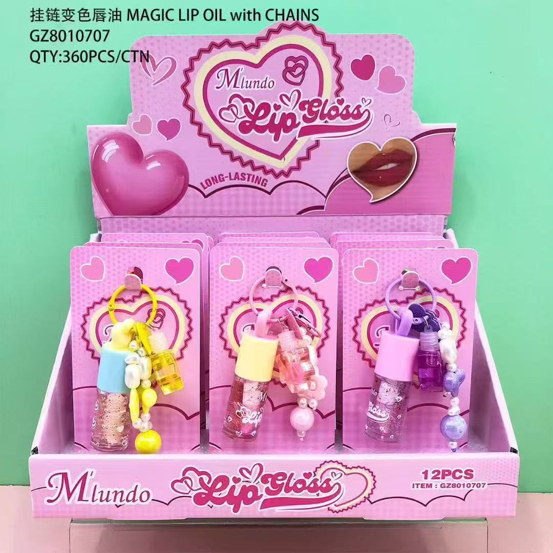 Nuevo producto Mlundo, set de aceite labial con cadena colgante y lámina dorada que cambia de color, hidratante, maquillaje hermoso y moderno, venta al por mayor del fabricante.