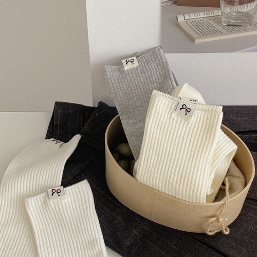 New Korean bow cloth label double needle socks for women's mid-long tube pile socks Korean simple calf socks white