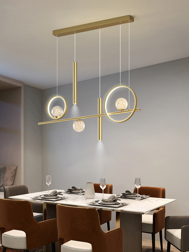 Chandelier de comedor moderno y simple 2024 nuevo bar doméstico de estilo pequeño mesa de comedor creativa minimalista lámpara de tira larga