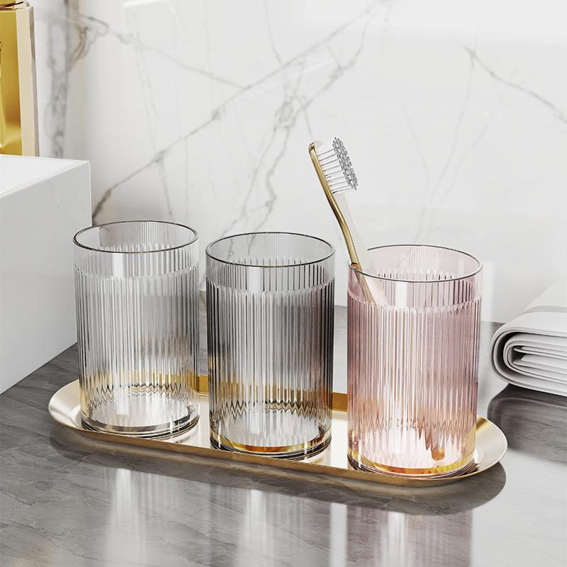 Luz de lujo estilo enjuague bucal taza de cepillo de dientes de alto aspecto taza hogar par lavado taza baño simple transparente PET cepillo de dientes taza