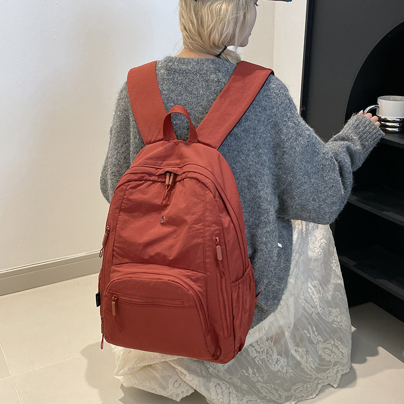 새로운 라이브 방송 경량 방수 나일론 천 대용량 퍼프 시리즈 간단한 통근 크로스 보더 유행 여성 배낭