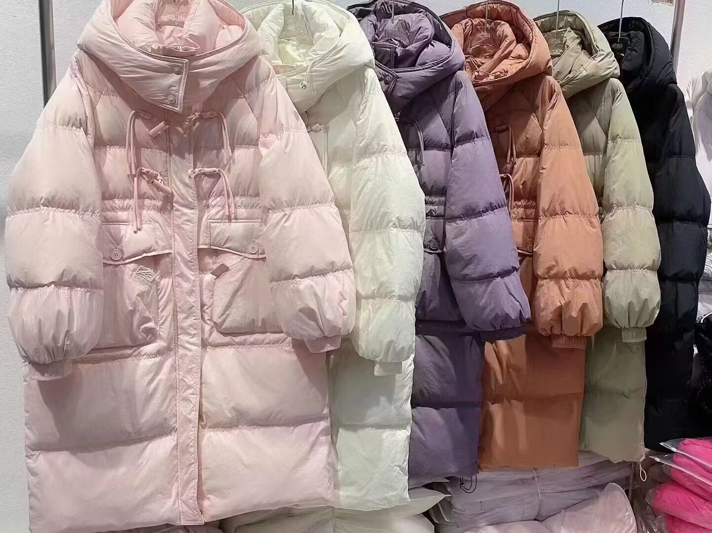 反季秋冬新款羽绒服女中国结中长款过膝连帽收腰加厚设计感小众外