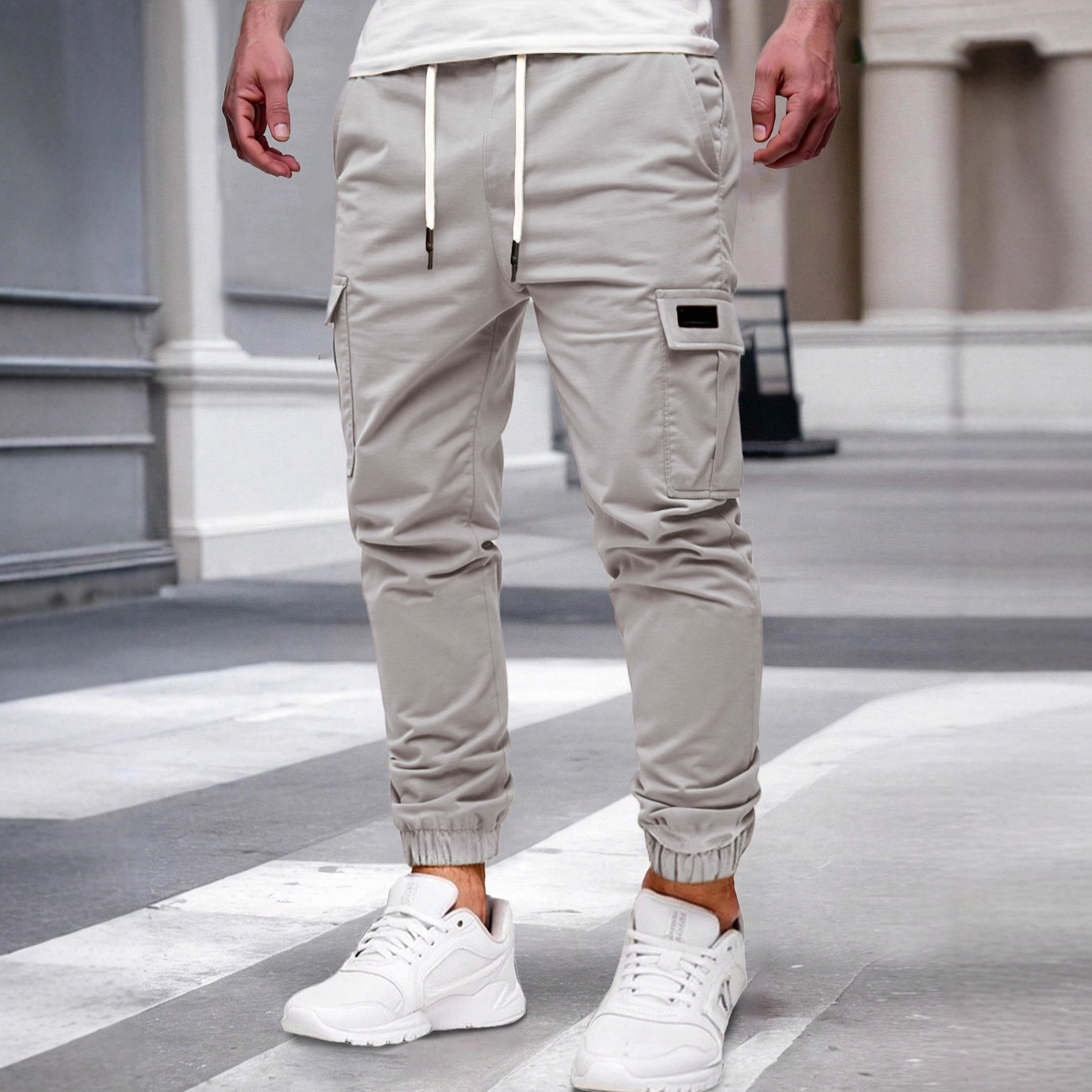 Nuevos pantalones de estilo europeo transfronterizo de hombre de bolsillo multi-bolsillo, pantalones de estilo de moda de comercio exterior.