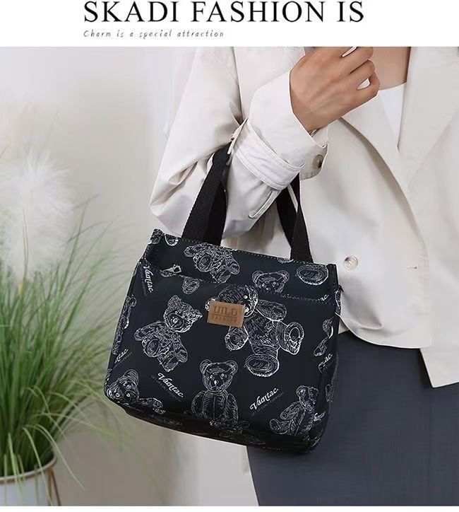 New handbag bento for mommy and office workers. Oxford cloth with rice for work. Fashionable lunch box with large capacity undefined