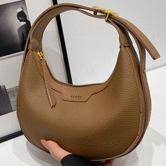 国境を越えた洋風ハンドバッグは女性2025の新モデルを組み合わせて肩を斜めに掛けて鞍を掛けてカジュアルなファッションの三日月バッグを包む