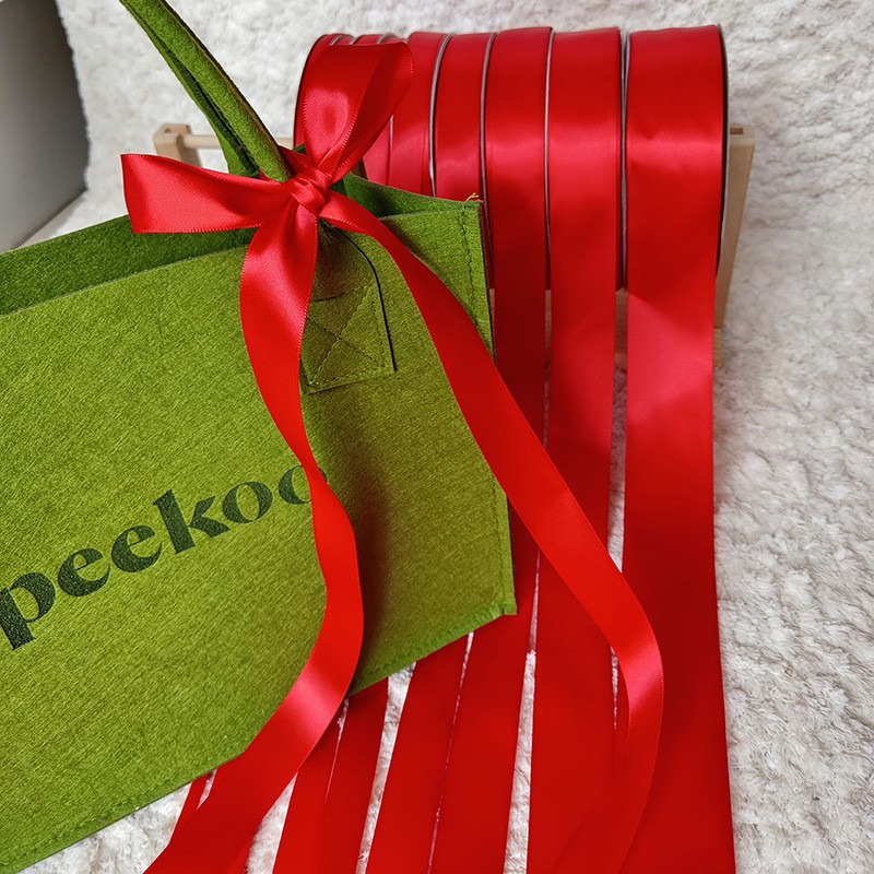 Suministro directo de fábrica cinta de poliéster encriptada de doble cara cinta roja boda festiva caja de dulces cinta de embalaje de regalo al por mayor