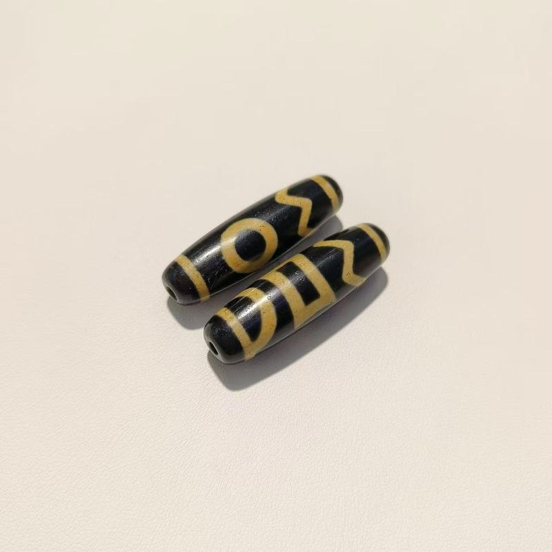 メーカー歯黄包糊九眼12 × 38mm天珠歯黄風化古法包糊瑪瑙天珠【a級】|undefined