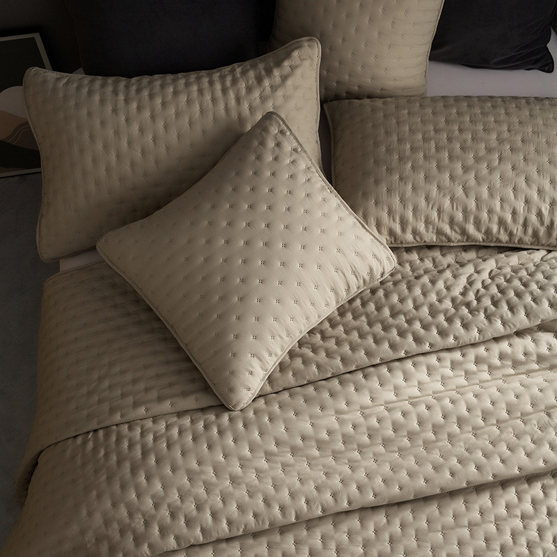 Fabricantes de agua directa de lavado de algodón de arroz cubierta de cama de tres piezas de color sólido simple engrosado cuatro estaciones conjunto de ropa de cama universal