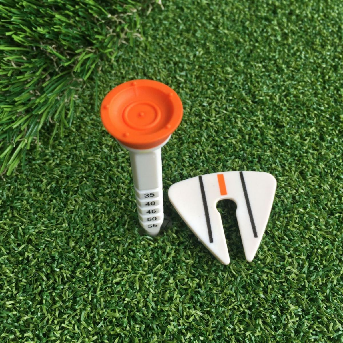 Golf nail tee altura ajustable dirección del objetivo Mark Ball asiento en caja ventilador suministros ventas directas de la fábrica