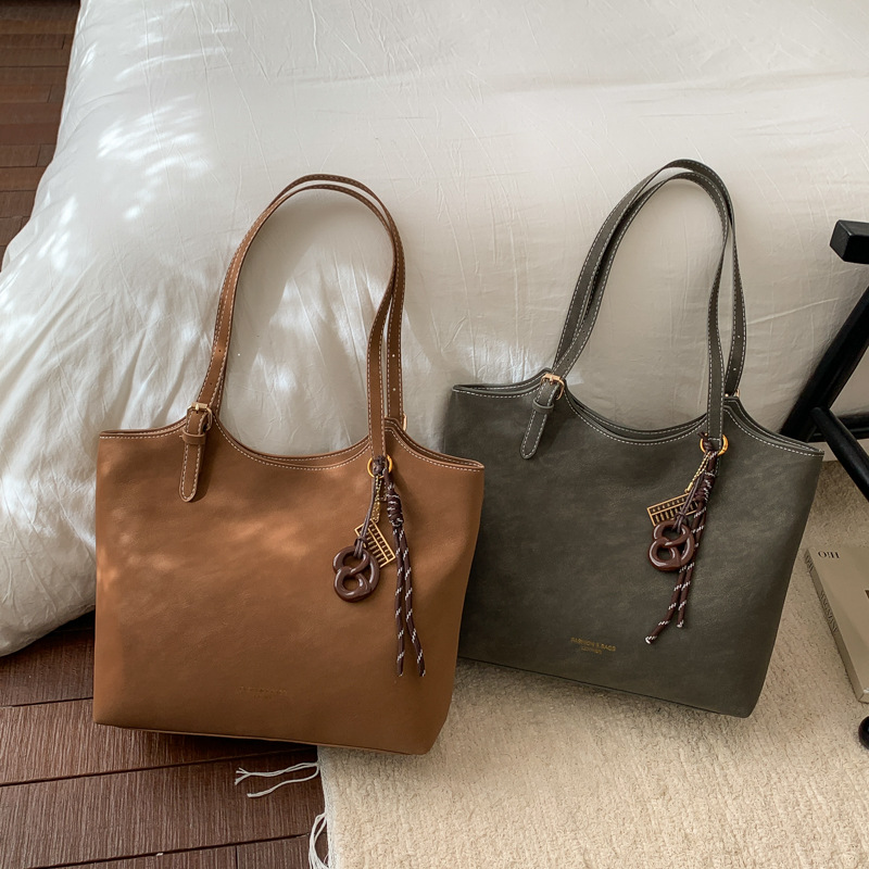 Bolsa de gran capacidad para mujeres 2026 nueva moda bolso de hombro de mujer alta textura versátil bolso de mujer de viaje mate
