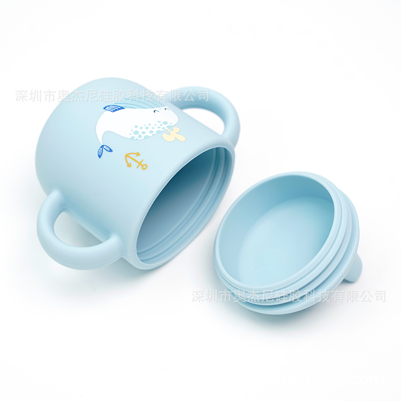 Taza de aprendizaje para bebés de silicona de grado alimenticio - 180 ml - Con boquilla y asas - Estampado disponible - En stock - Venta al por mayor
