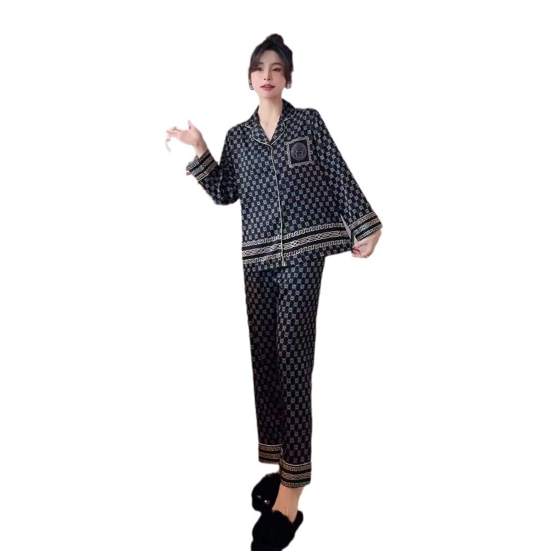 2023 primavera y otoño nueva pareja pijamas de seda de hielo de las mujeres de manga larga estilo europeo y americano de los hombres al aire libre desgaste del hogar