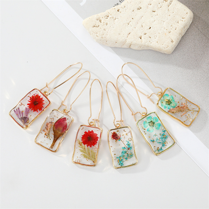 Simple Style Style 1 Pair Simple Style Dried Flower Epoxy Transparent Synthetic Resin Alloy Dangling Earrings