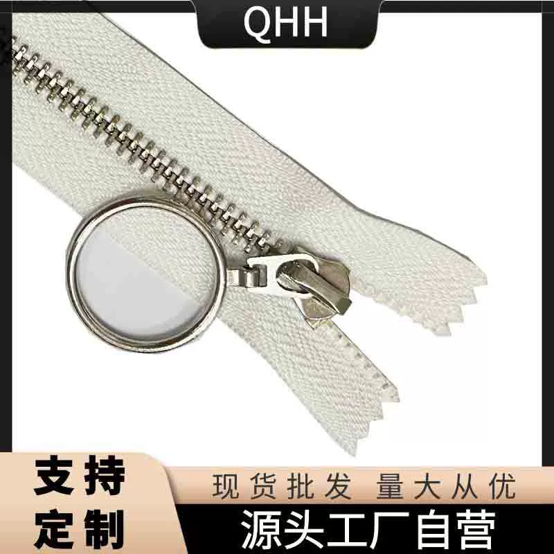 Metal platinum trousers with zipper, sweater, golden bag