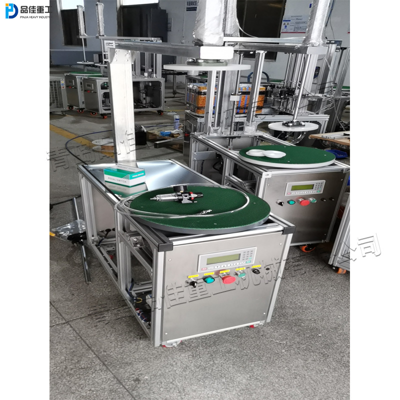 Small hardware tray entangled machine with a top carton wrap machine…