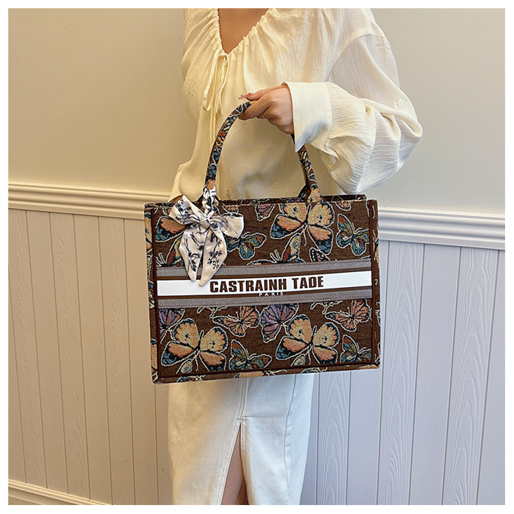 Comercio exterior transfronterizo al por mayor bolso de mano para mujeres 2024 nueva moda impresión popular tamaño de mariposa bolso de hombro
