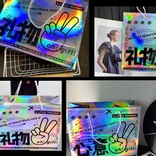 白卡纸手提袋批发镭射创意服装店礼品袋高级感牛皮纸银卡镜面定制