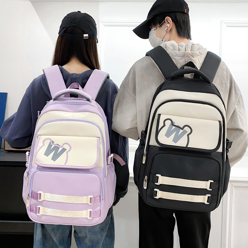 Mayorista nueva mochila de gran capacidad de moda simple campus mochila escolar de tendencia de carga mochila de viaje