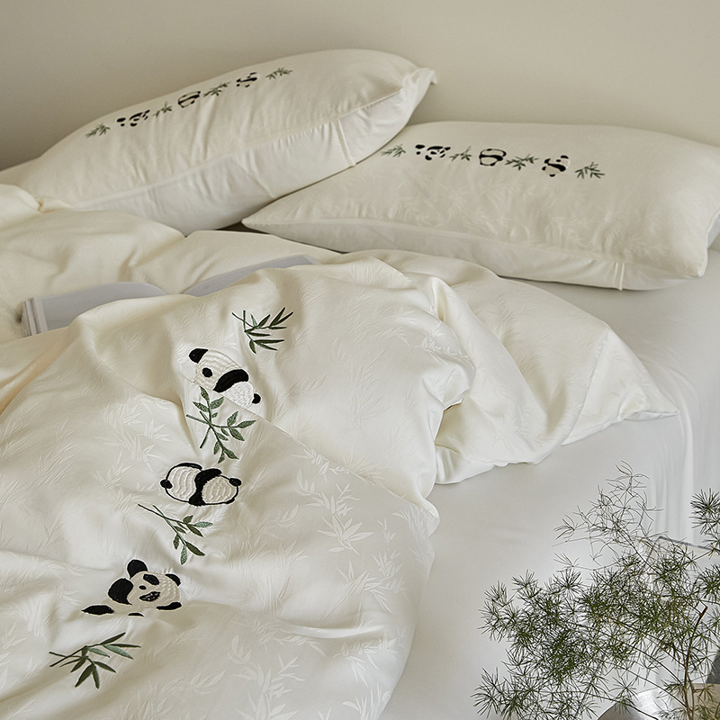 Cama de seda de hielo de cuatro piezas de dibujos animados 2025 nuevas sábanas, fundas de edredón, ropa de cama de dormitorio de tres piezas, transpirable y cómoda