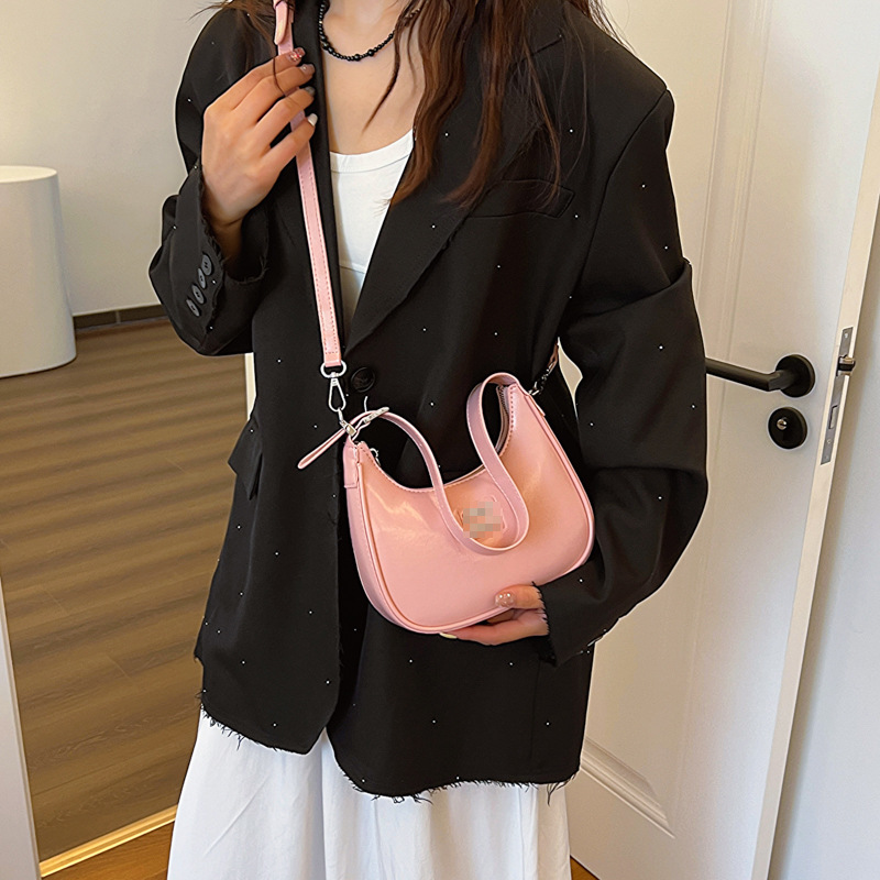 Bolsos de mujer al por mayor, nueva tendencia, bolsos de hombro de moda de alta gama, color sólido, dulce y fresco, bolso de bola de masa de mensajero con estampado brillante