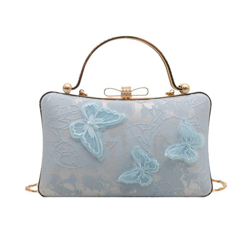 Estilo nacional transfronterizo diseño de nicho mariposa amor flor cena bolso femenino 2025 nuevo temperamento cadena bolso de mensajero