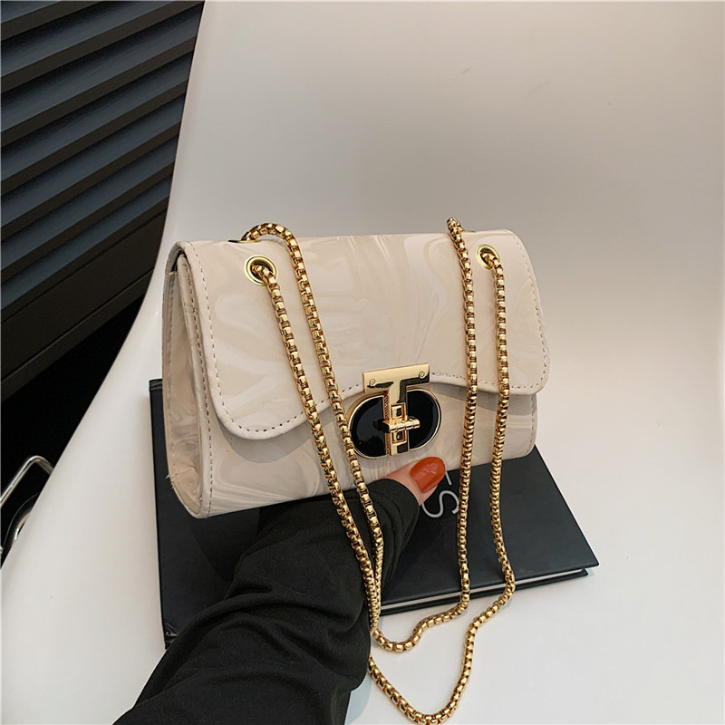 Nicho bolso de diseño bolso de mujer nuevo estilo de moda de marea de viento de bloqueo de hombro mochila de textura de cadena pequeña bolsa cuadrada de moda