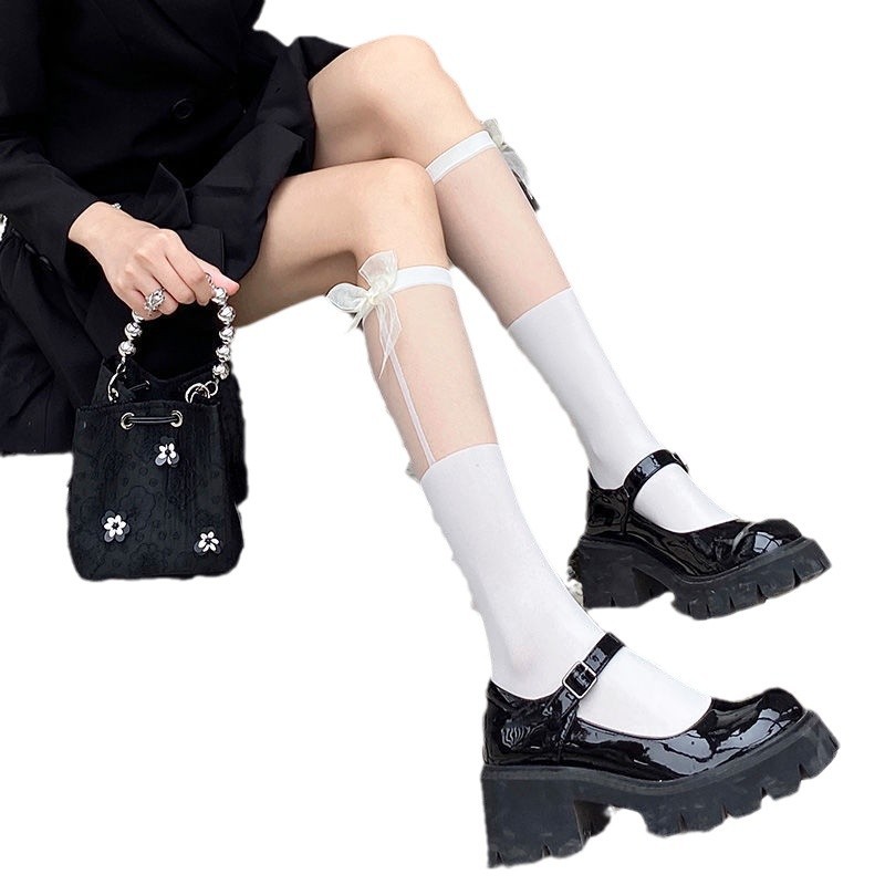 白いjkレースのストッキングは靴下の女性の中筒の白い糸の蝶結びのふくらはぎの靴下のロリータの春夏の薄い金の通気性をつなぎます。
