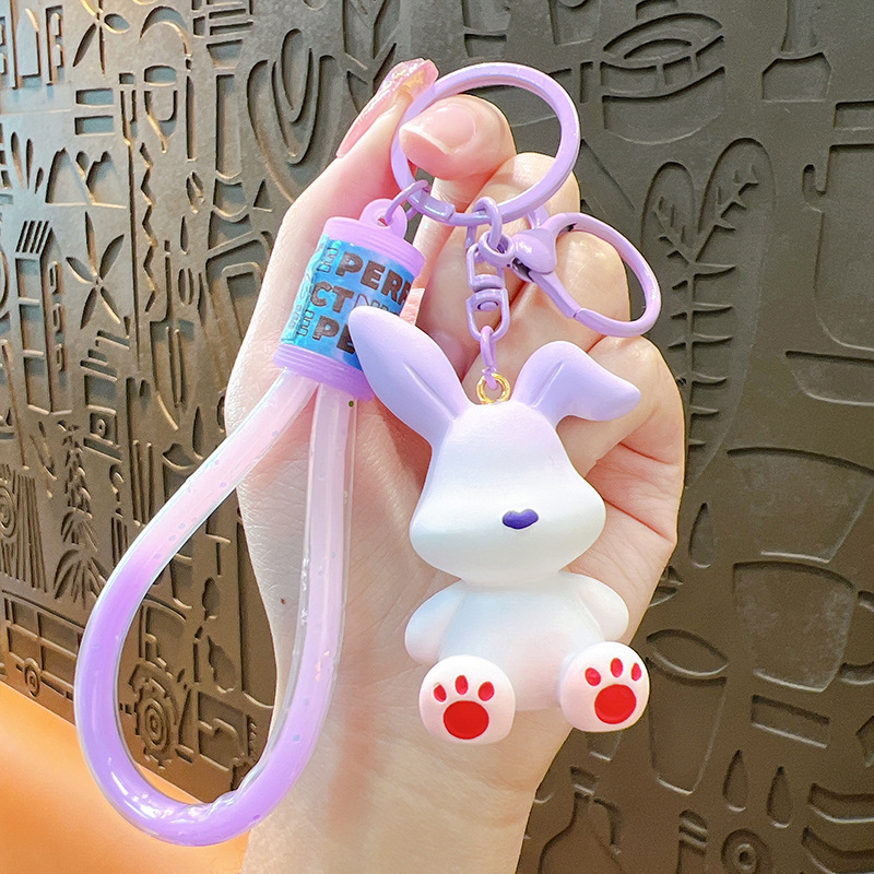 Accesorios llavero pequeño regalo moda gradiente creativo plegable conejo colgante lindo exquisito coche mochila
