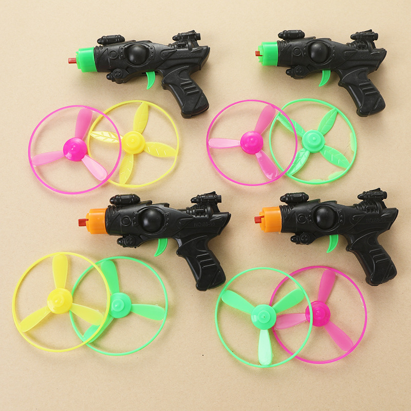 Juguete de fábrica al por mayor bambú libélula pistola catapulta Frisbee platillo volador niños avión Gyro