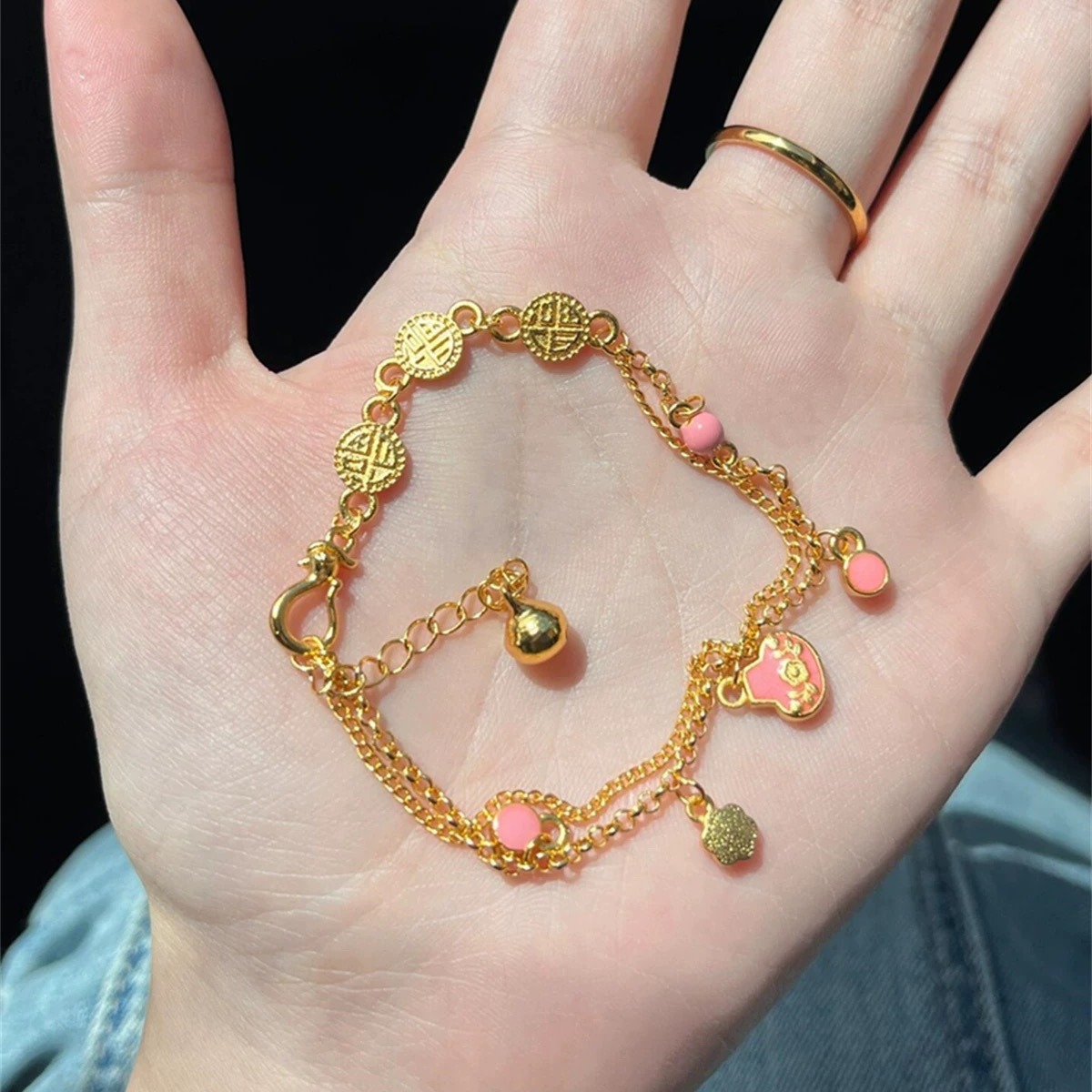 Shajin pink silver ingot bell lucky brand bracelet does not fade for a long time sweet fresh temperament high sense does not fade for a long time_voghion.com